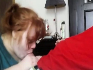 Redhead wife has oral sex