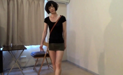 crossdresser wearing a mini skirt