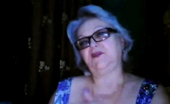 Russian granny ex-teacher flashing her big tits on webcam