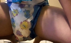 Messing my diaper in a Onsie