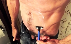 Lean daddy Richard shaves and strokes his cock