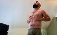 Beardy hunk assplays and jerks till cum