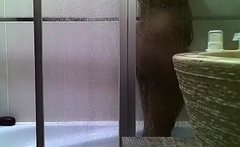 Curvy indian stepmom spied in the shower