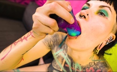 Tattooed model Illuz tests out her toys